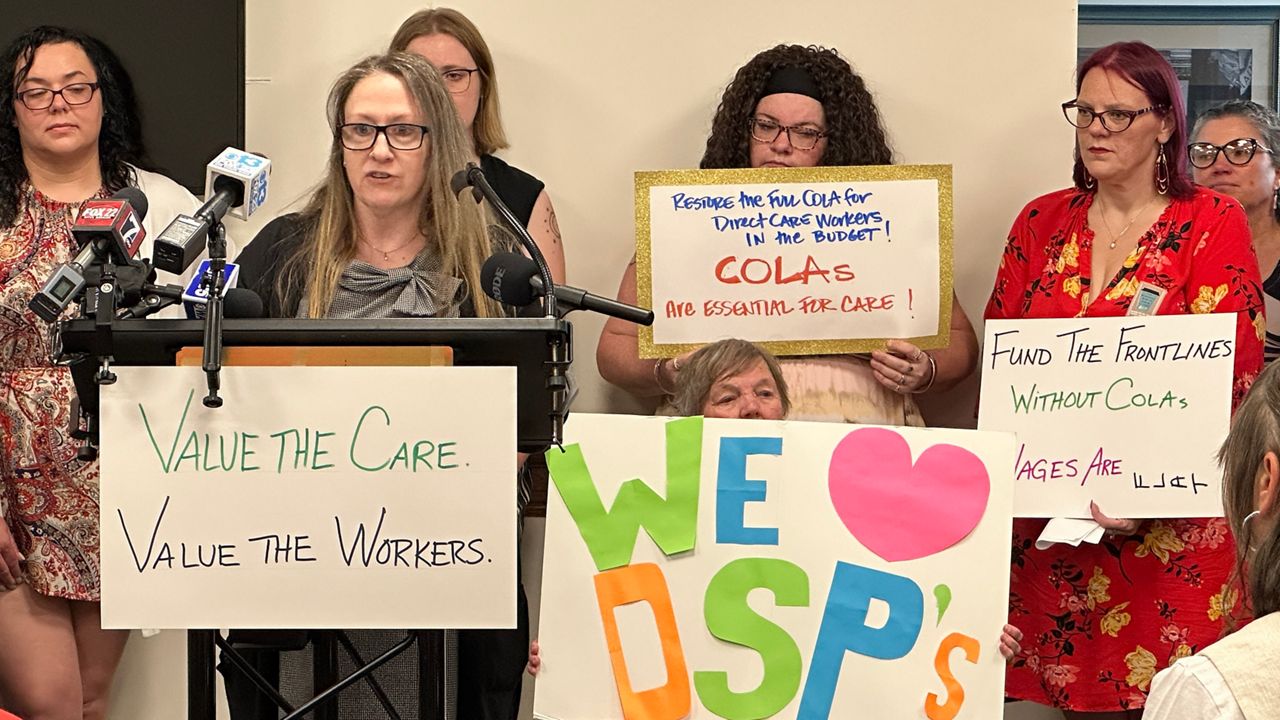 Rep. Jennifer Poirier (R-Skowhegan), left, speaks about the importance of direct care workers on Thursday at the State House. (Spectrum News/Susan Cover)