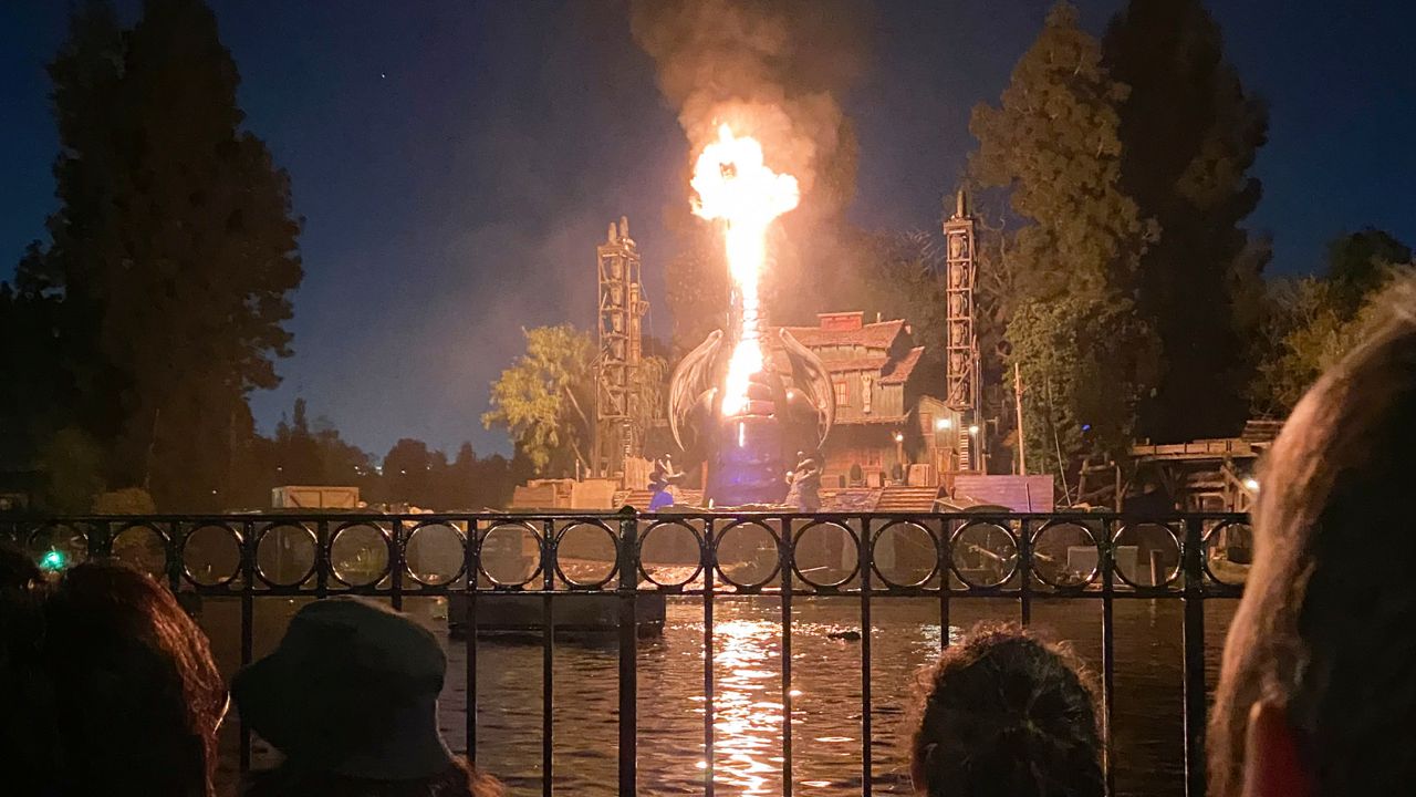 This photo courtesy of Shawna Bell shows a fire during the “Fantasmic!" show in the Tom Sawyer Island section of Disneyland resort in Anaheim, Calif., on Saturday, April 22, 2023. (Courtesy Shawna Bell via AP)
