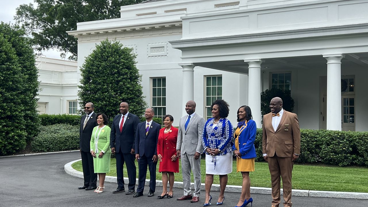 Leaders of the Divine Nine, a group of historically Black sororities and fraternities, line up for a picture outside the West Wing ahead of their meeting with President Joe Biden on Friday, May 17, 2024 (Spectrum News)