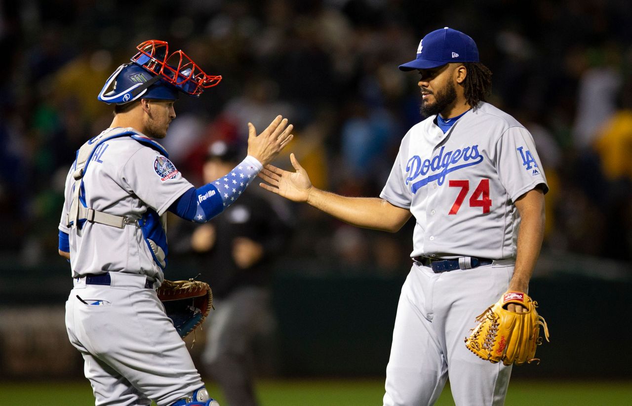 Los Angeles Dodgers' closing pitcher Kenley Jansen (74) celebrates