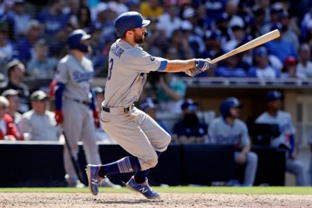 San Diego Padres' Hunter Renfroe hits a walkoff grand slam during the ninth  inning of a baseball game against the Los Angeles Dodgers, Sunday, May 5,  2019, in San Diego. (AP Photo/Gregory