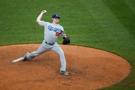 Harper, Hoskins rally Phillies past Dodgers with 4-run 7th