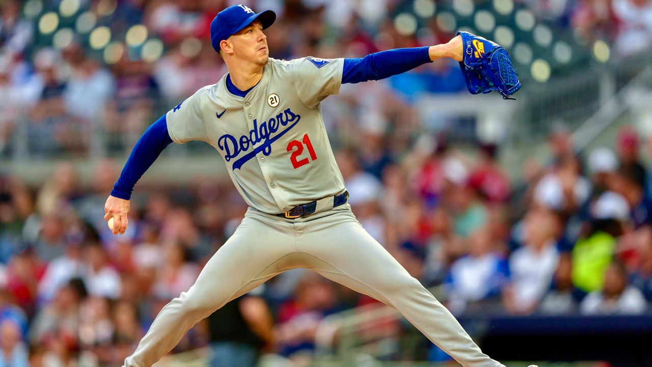 Los Angeles Dodgers pitcher Walker Buehler throws in the first inning of a baseball game against the Atlanta Braves, Sunday, Sept. 15, 2024, in Atlanta. (AP Photo/Jason Allen)