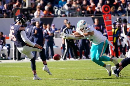 Miami Dolphins linebacker Andrew Van Ginkel (43) runs onto the field before  the start of an NFL football game against the Buffalo Bills, Sunday, Sept.  25, 2022, in Miami Gardens, Fla. (AP