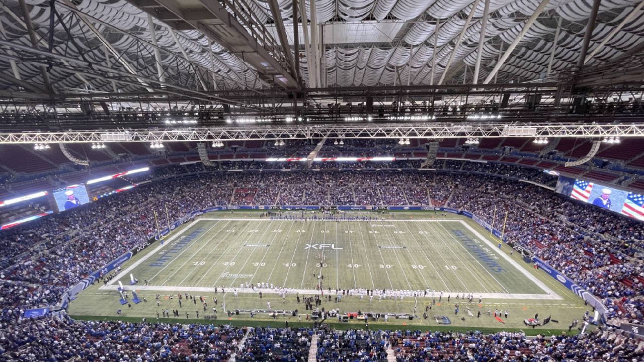 The crowd at The Dome at America's Center stands during a performance of the national anthem prior to an XFL football game between the St. Louis Battlehawks and the Arlington Renegades on March 12, 2023 in St. Louis, Mo. (Spectrum News/Gregg Palermo)