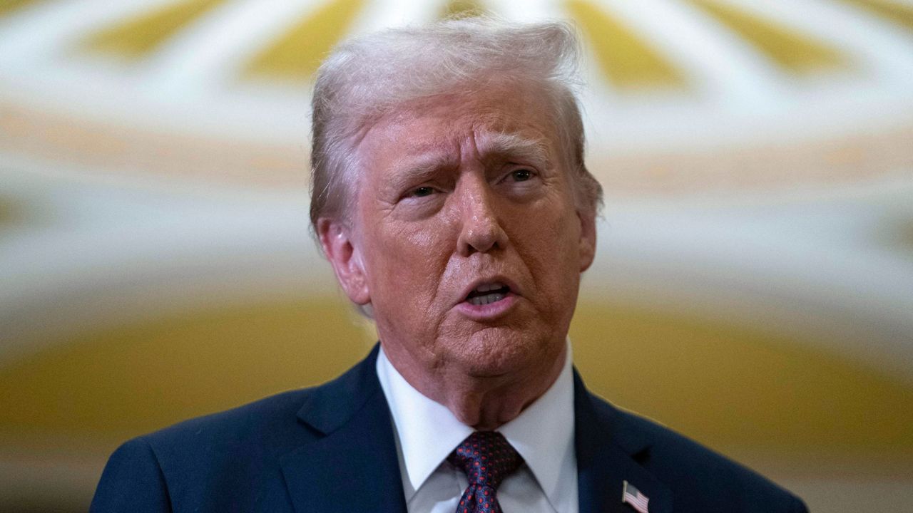 President-elect Donald Trump talks to reporters after a meeting with Republican leadership at the Capitol on Wednesday, Jan. 8, 2025, in Washington. (AP Photo/Jose Luis Magana)