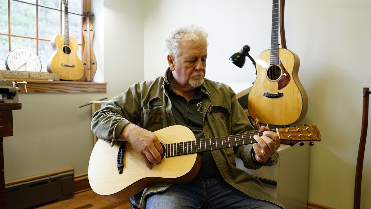 Doug Naselroad founded Troublesome Creek Stringed Instrument Company in 2019 (Spectrum News 1/Mason Brighton)