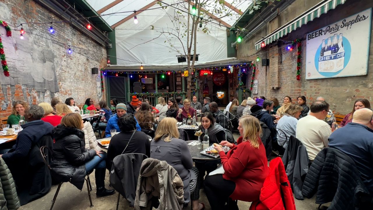 Large holiday parties fill Arnold's indoor patio during lunchtime.