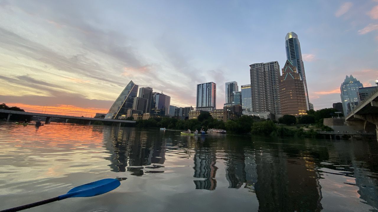 https://s7d2.scene7.com/is/image/TWCNews/Downtown_Austin_TX_Texas_Mostly_Sunny_Sunset_Hot_Summer_SN_ReidLybarger_062623_7