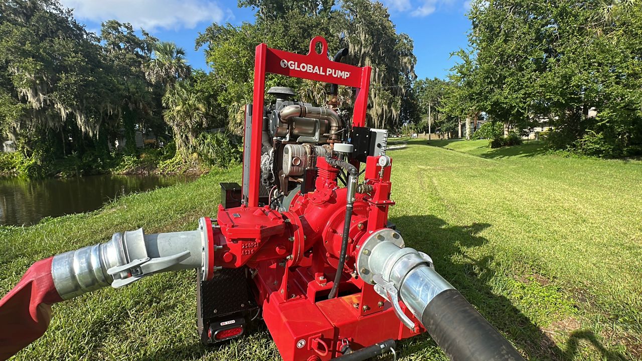 This is one of 2 commercial pumps that the city of Edgewater purchased recently.  They were bought by the Interim City Manager Joseph Mahoney, who started as interim manager on June 2. This pump is located Queen Palm Drive and helped clear the flooding that happened there earlier in the day. (Spectrum News/Nick Allen)