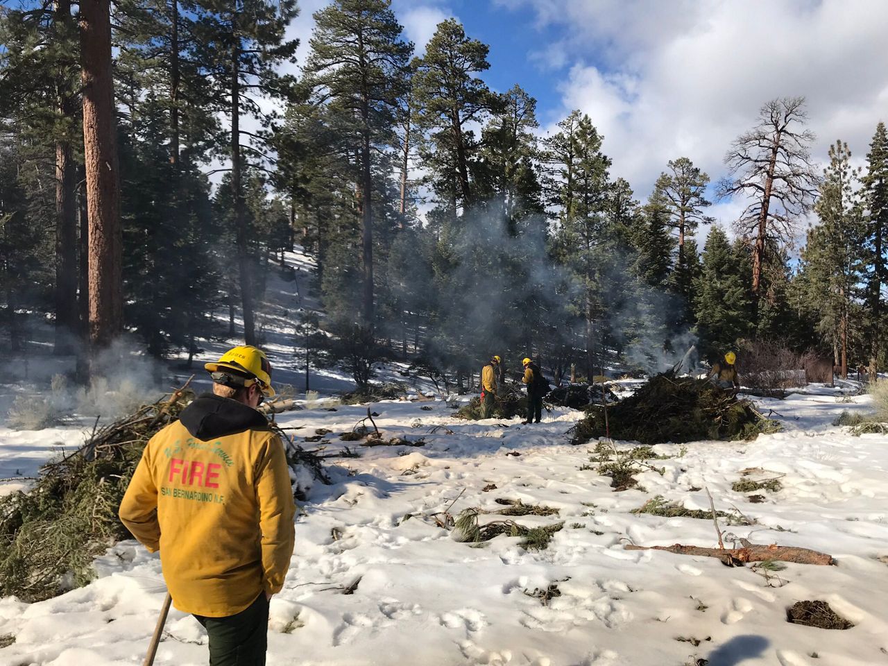 Despite the snow crews will burn piles in Big Bear on November 25 to create a defensible space for the community in case of wildfires.
