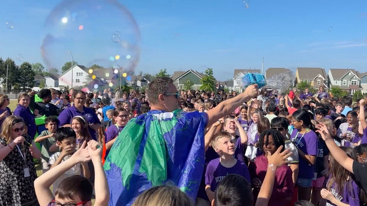 Buckhorn Creek Elementary School Principal Daniel Simmons celebrates getting the EL Education School Credential. (Spectrum News 1/Jenna Rae Gaertner)