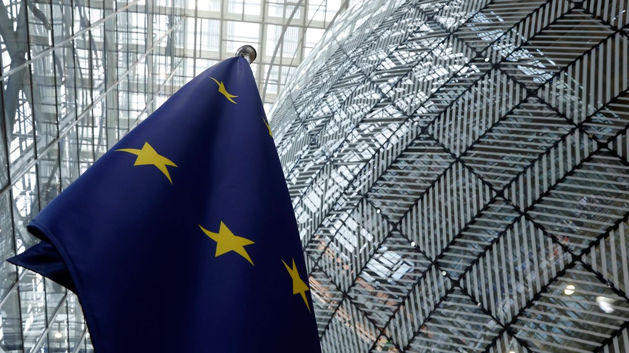 The European Union flag stands inside the atrium at the European Council building in Brussels, June 17, 2024. (AP Photo/Omar Havana, File)