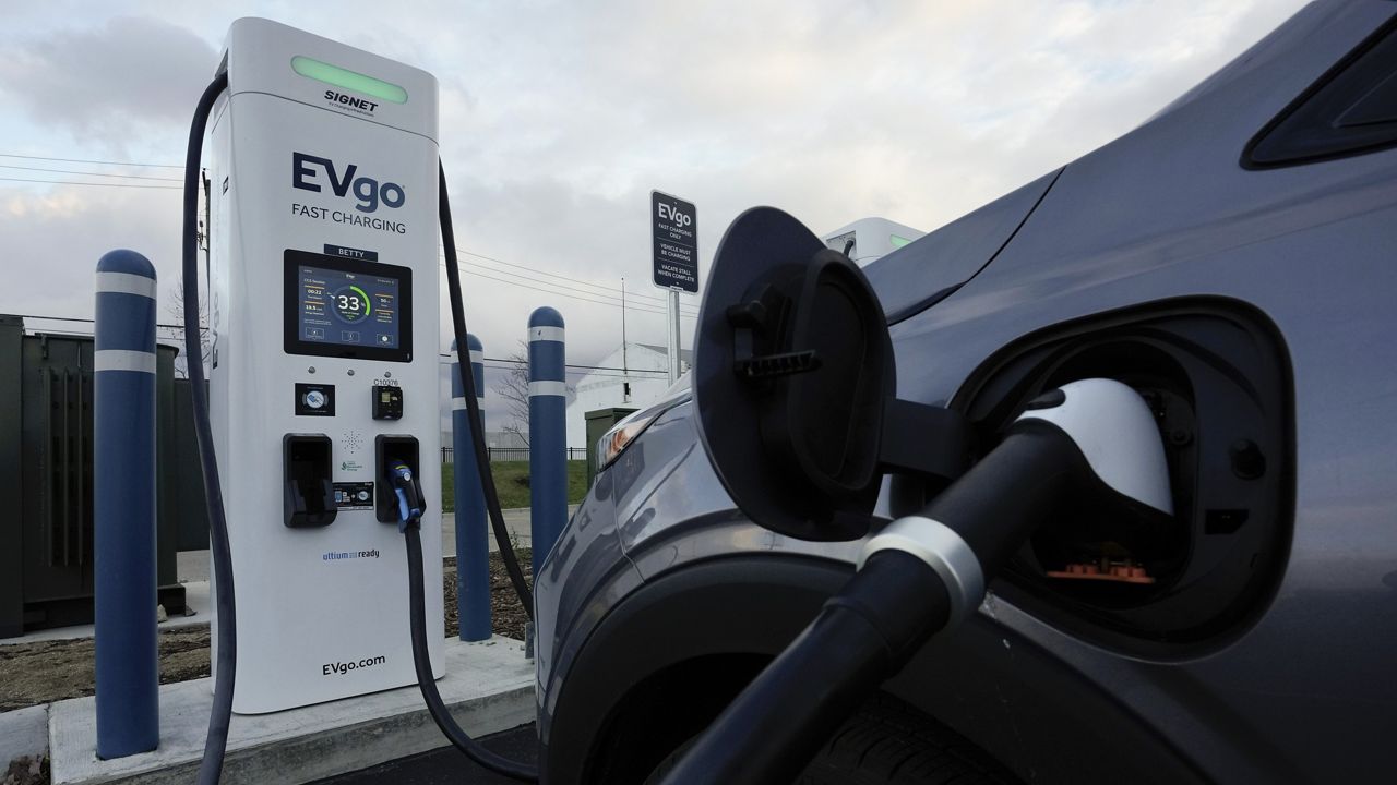 An electric vehicle charges at an EVgo fast charging station in Detroit on Nov. 16, 2022. (AP Photo/Paul Sancya)