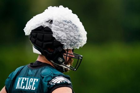 NFL executive hints that Guardian Caps could eventually be worn in games,  along with position-specific helmets 