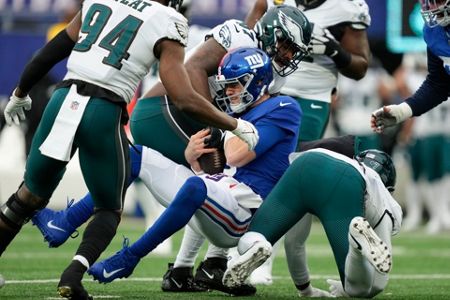 New York Giants wide receiver Isaiah Hodgins (18) runs with the ball  against the Washington Commanders during an NFL football game Sunday, Dec.  4, 2022, in East Rutherford, N.J. (AP Photo/Adam Hunger