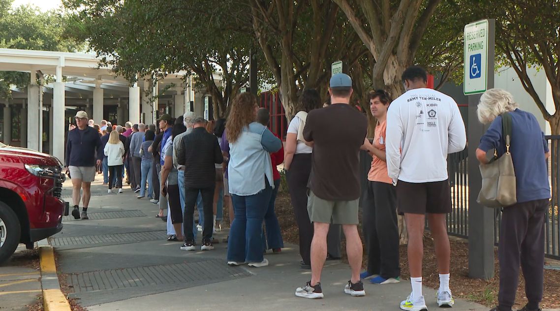 Houston voters welcome long lines as early voting begins