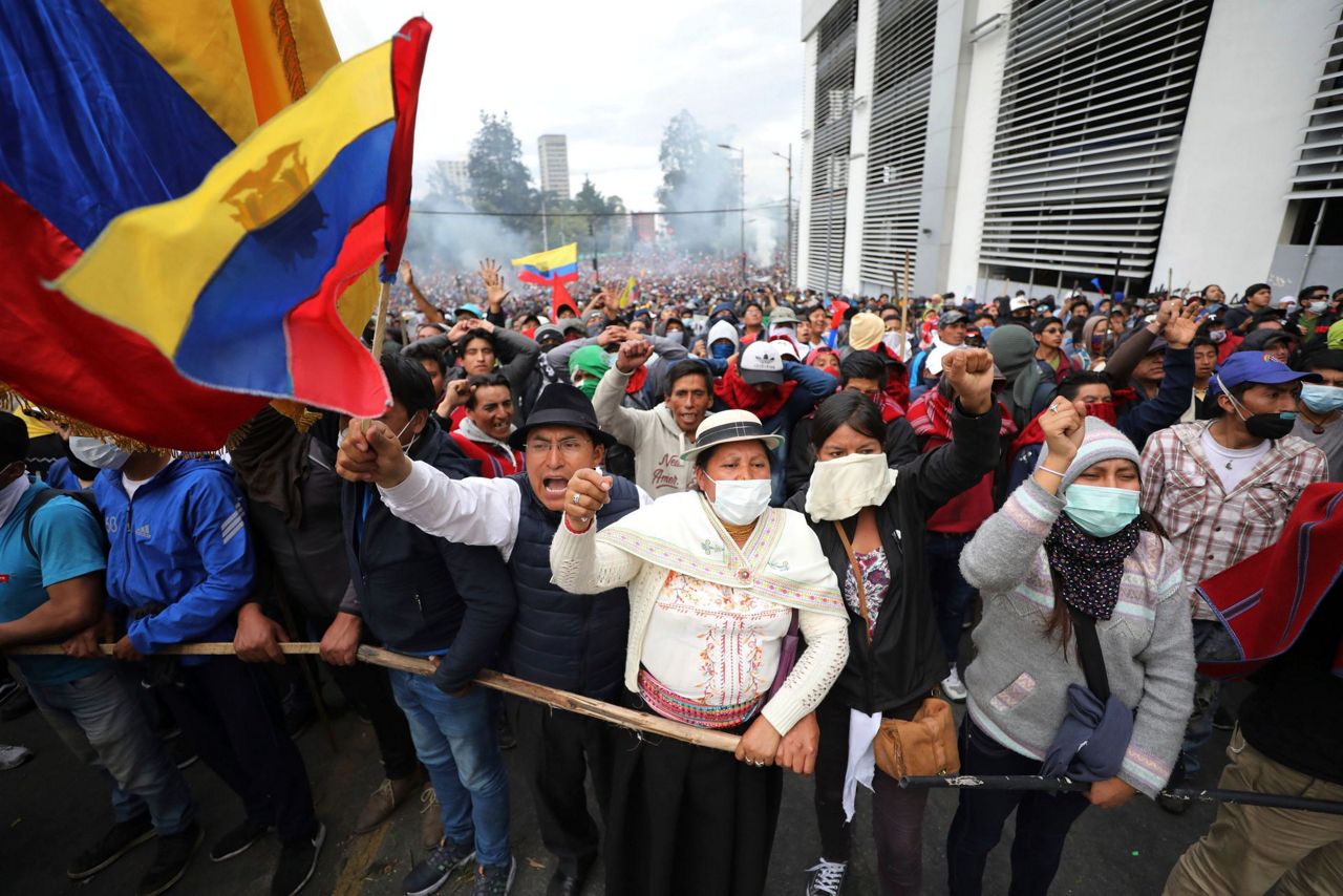 Ecuador's leader moves government seat as clashes escalate