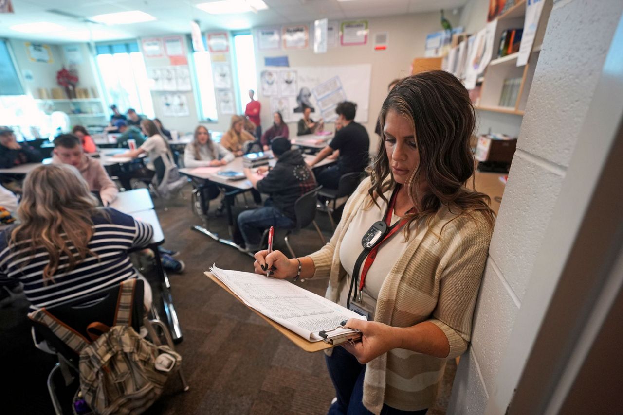 Phones are distracting students in class. More states are pressing schools to ban them