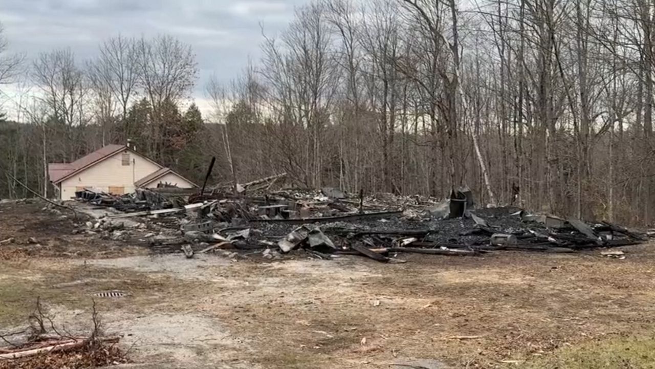 One of the Elan School’s buildings was destroyed by a fire over the weekend. The shuttered private school for troubled teens that was once the center of abuse allegations and was mentioned in the murder trial of Kennedy cousin Michael Skakel. (Spectrum News/Matthew Jaroncyk)