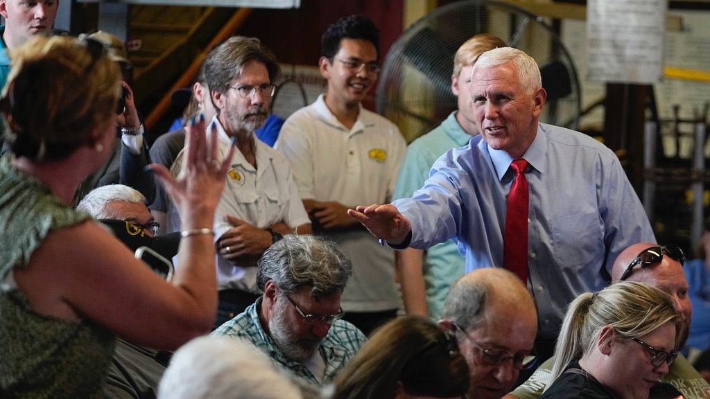 Republican presidential candidate and former Vice President Mike Pence greets guests before speaking during a stop at the Indiana State Fair, Wednesday, Aug. 2, 2023, in Indianapolis. (AP Photo/Darron Cummings)