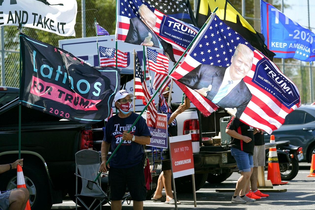 With salsa, caravans, Cubans make last push to reelect Trump