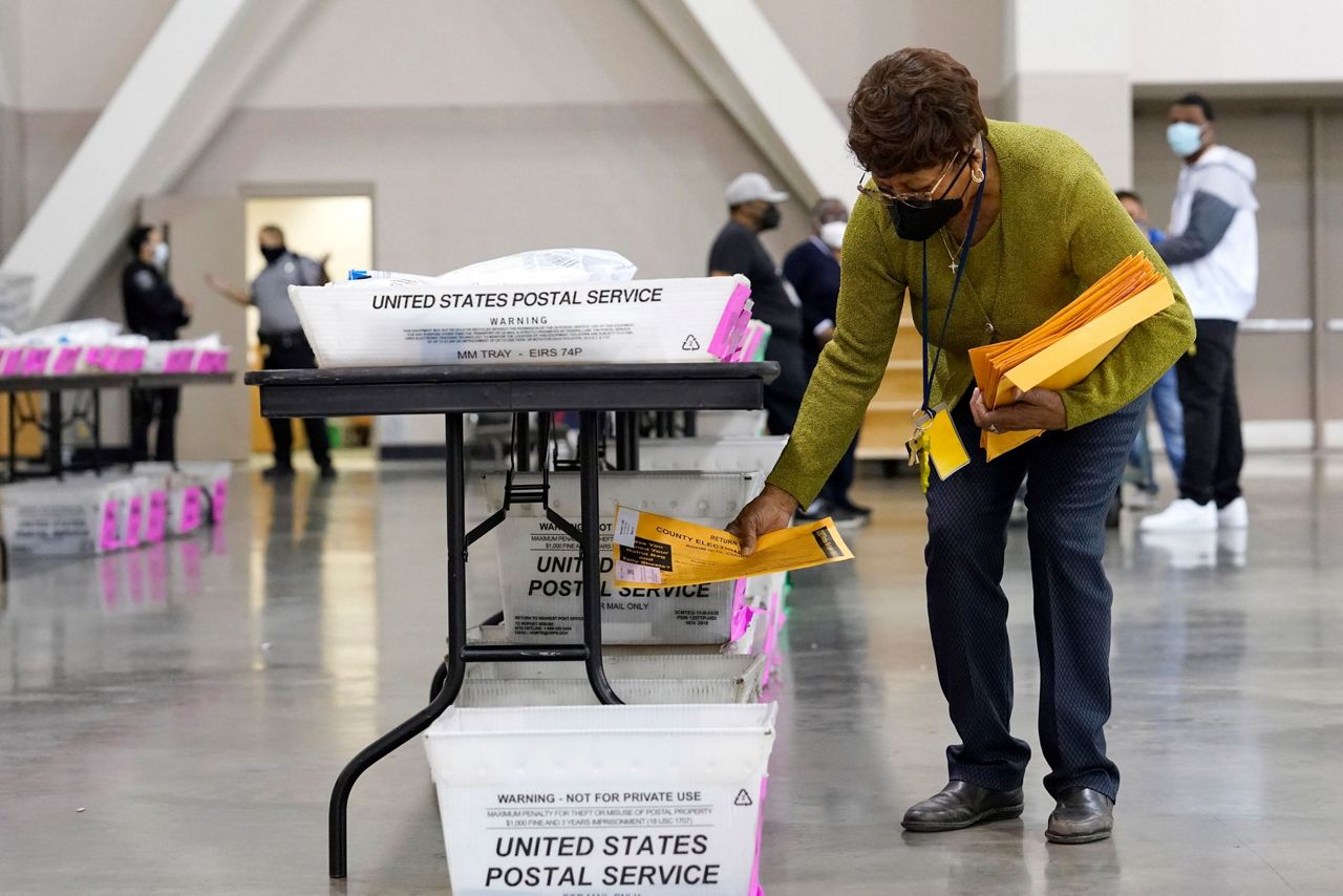 Wisconsin recount: Masks, plexiglas and lots of ballots