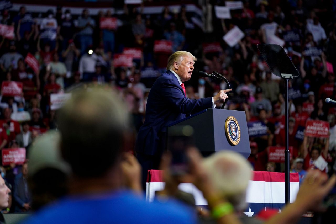 Trump rally size raises question about risk in age of virus