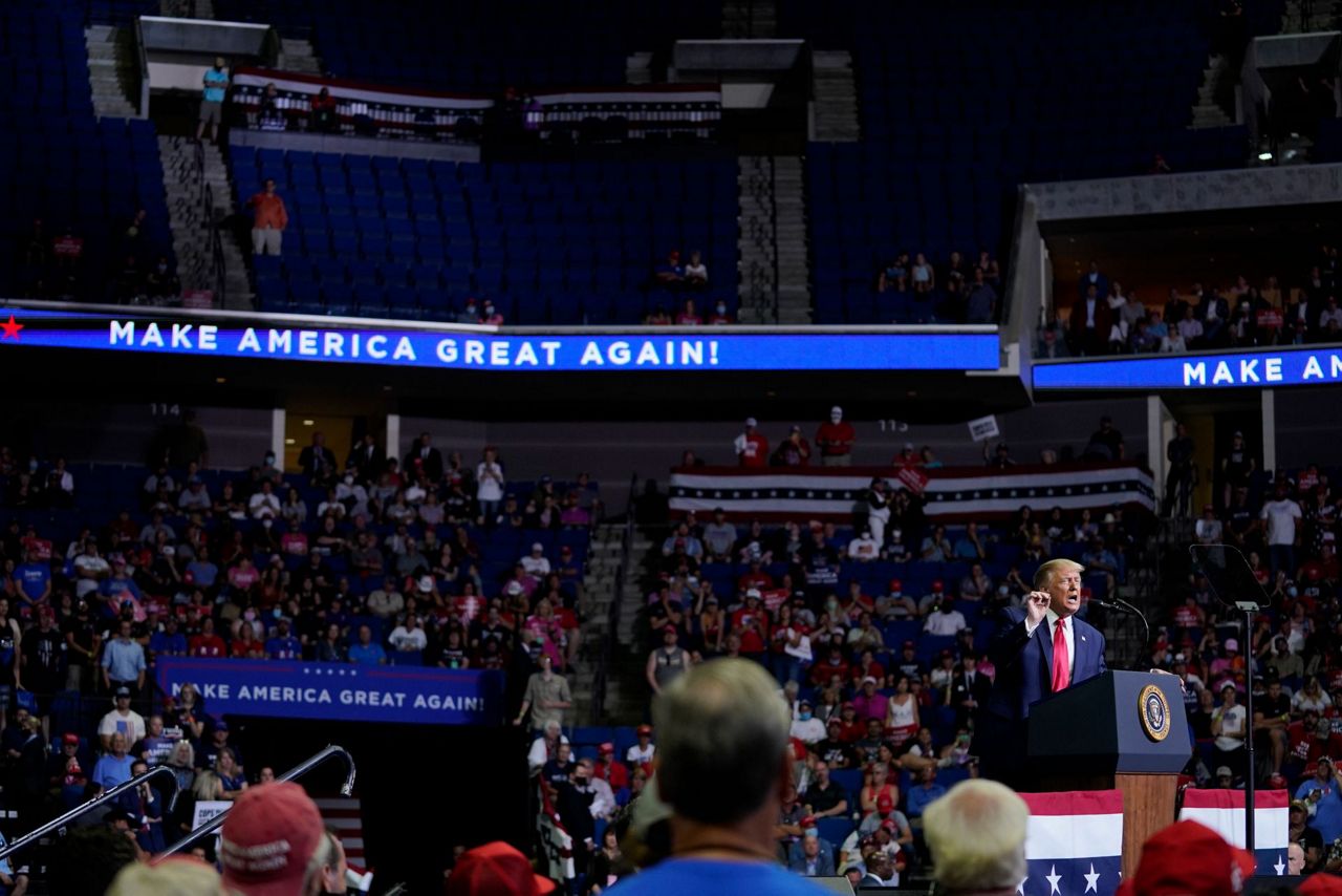 Trump rally size raises question about risk in age of virus