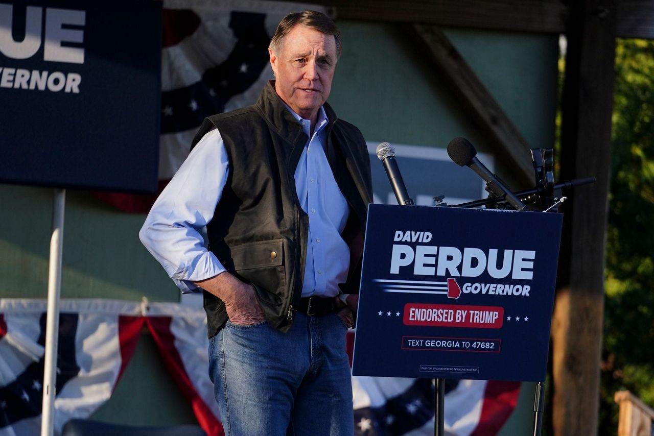 Kemp says he'll spend millions against Perdue in Georgia