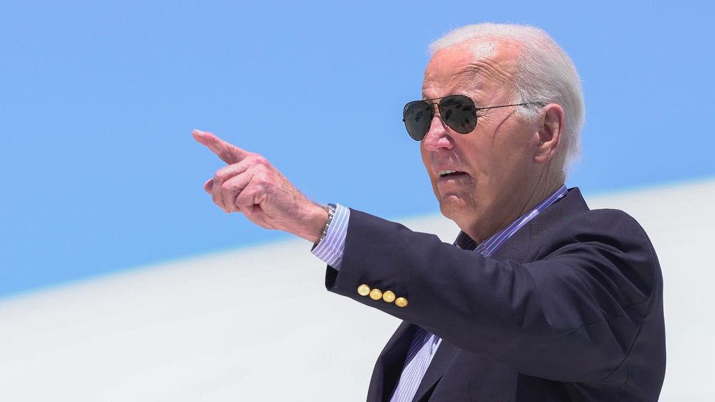 President Joe Biden points as he arrives on Air Force One at Dane County Regional Airport to attend a campaign rally in Madison, Wis., Friday, July 5, 2024. (AP Photo/Manuel Balce Ceneta)