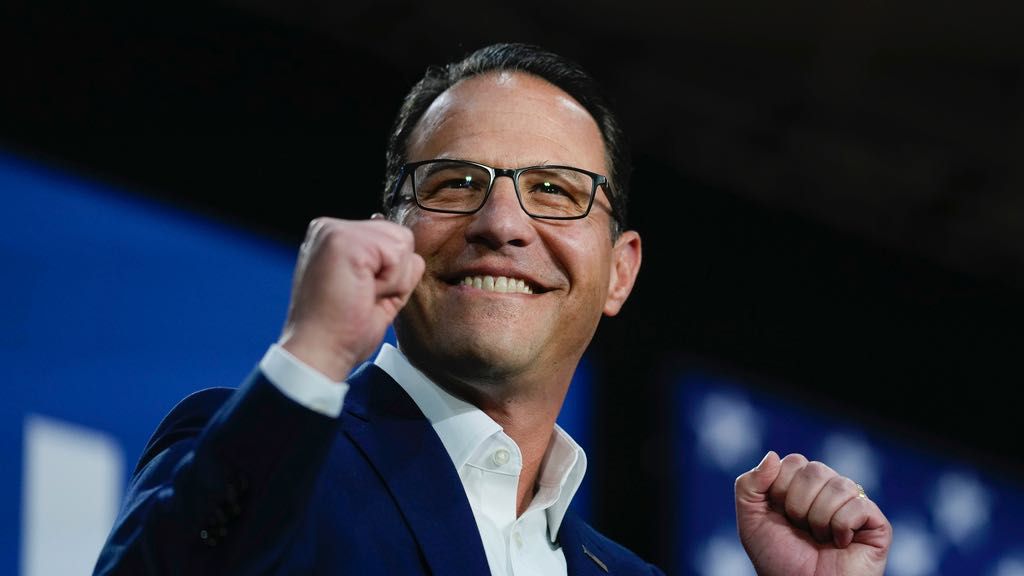 Pennsylvania Gov. Josh Shapiro gestures at a campaign event for Democratic presidential candidate Vice President Kamala Harris in Ambler, Pa., Monday, July 29, 2024. (AP Photo/Matt Rourke)