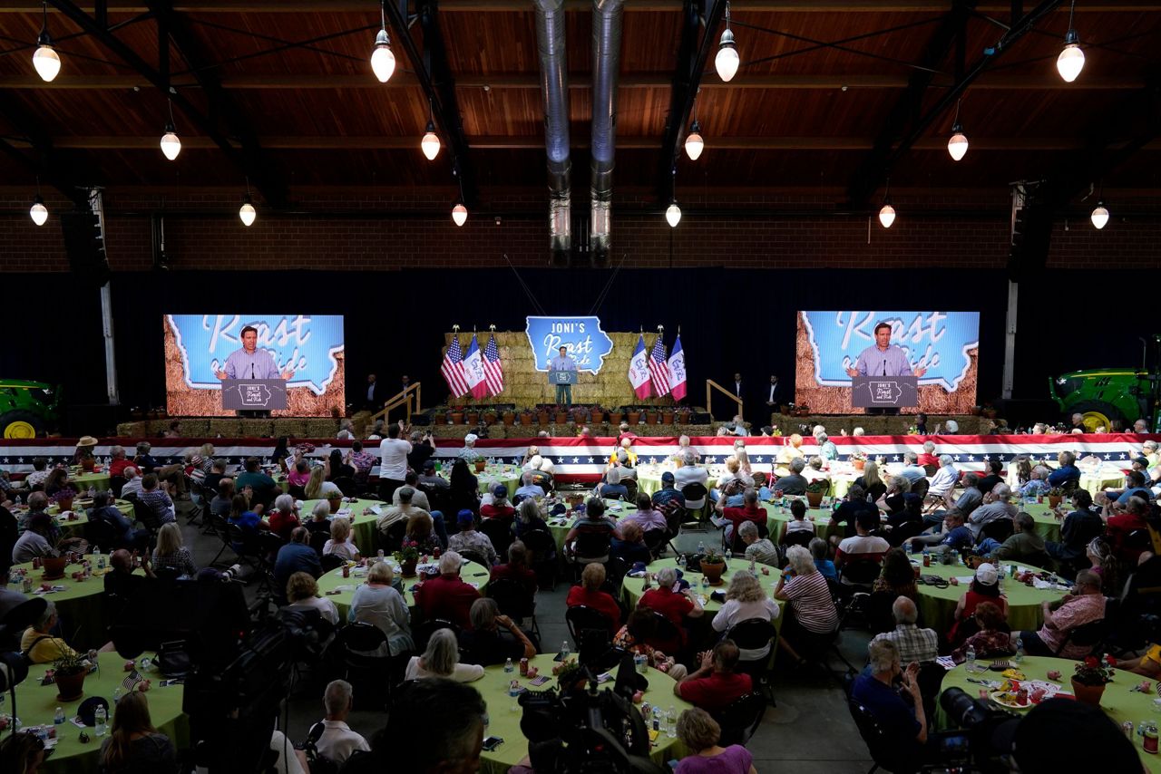 DeSantis signs Bible, Pence hops on motorcycle at 'Roast and Ride