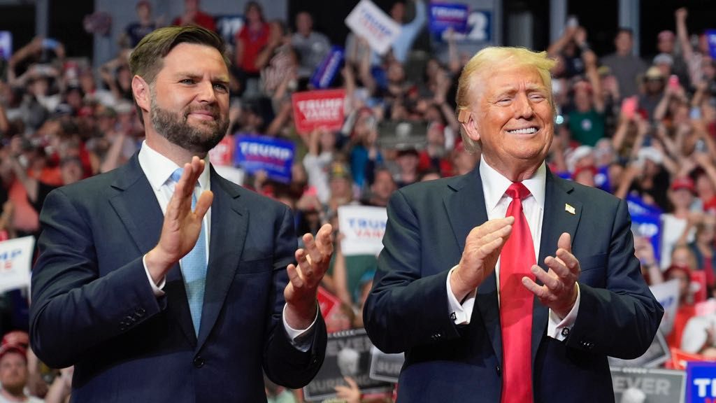 Republican presidential candidate former President Donald Trump and Republican vice presidential candidate Sen. JD Vance, R-Ohio, arrive a campaign rally, Saturday, July 20, 2024, in Grand Rapids, Mich. (AP Photo/Evan Vucci)