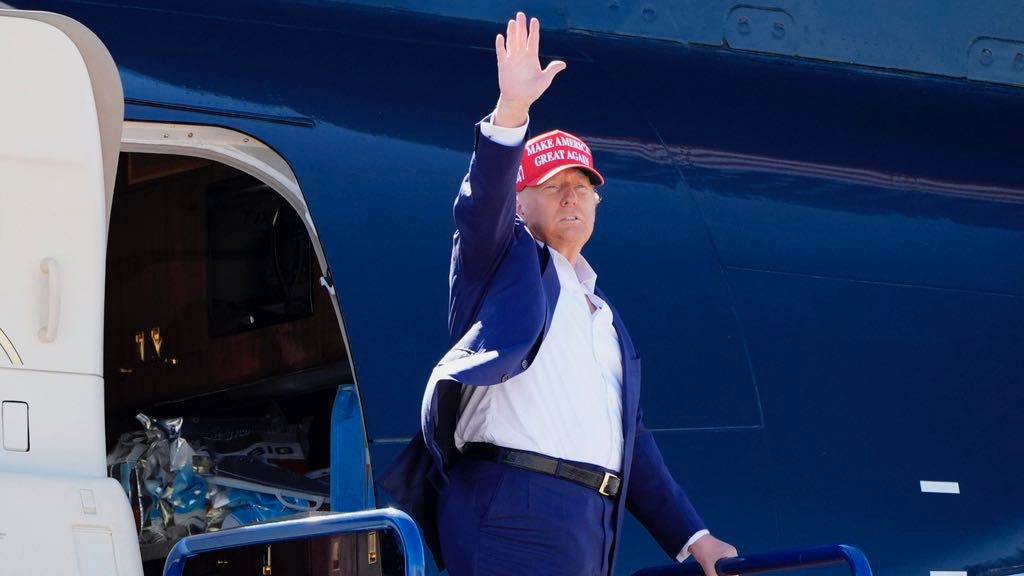 Republican presidential nominee former President Donald Trump waves as he departs a campaign event on a plane at Central Wisconsin Airport, Saturday, Sept. 7, 2024, in Mosinee, Wis. (AP Photo/Alex Brandon)