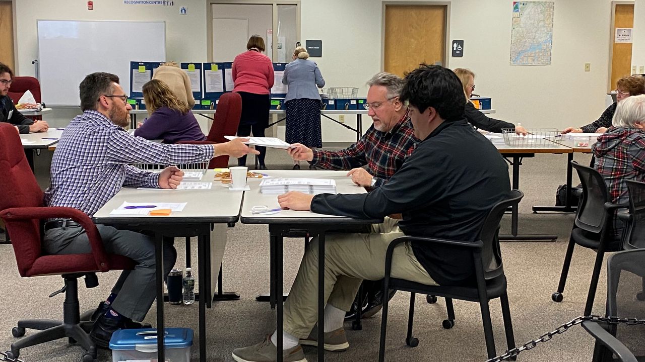 State election workers, shown here at a recount in 2022, would get more time to do their jobs if ballot Question 5 passes. (Spectrum News file photo)