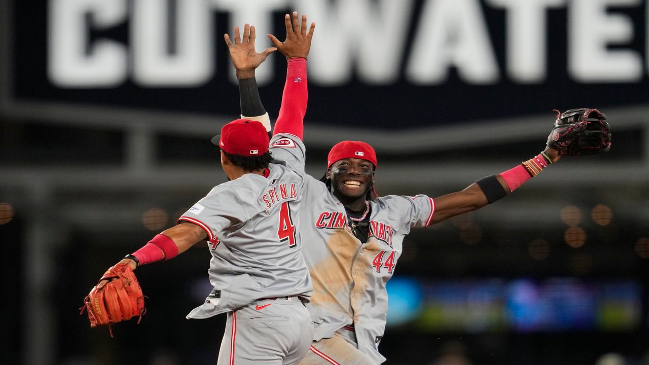 Cincinnati Reds center fielder TJ Friedl catches a fly ball. (AP Photo/Carolyn Kaster)