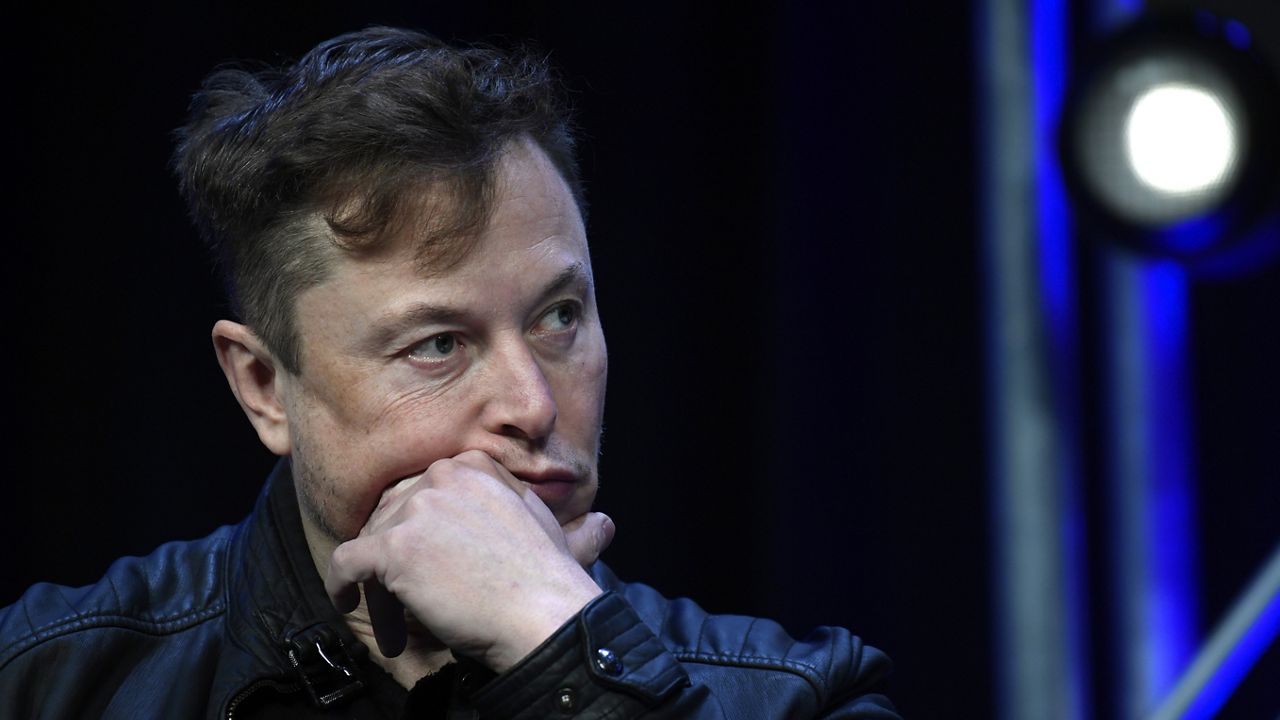 Tesla and SpaceX chief executive officer Elon Musk listens to a question as he speaks at the SATELLITE Conference and Exhibition in Washington. (AP Photo/Susan Walsh, File)