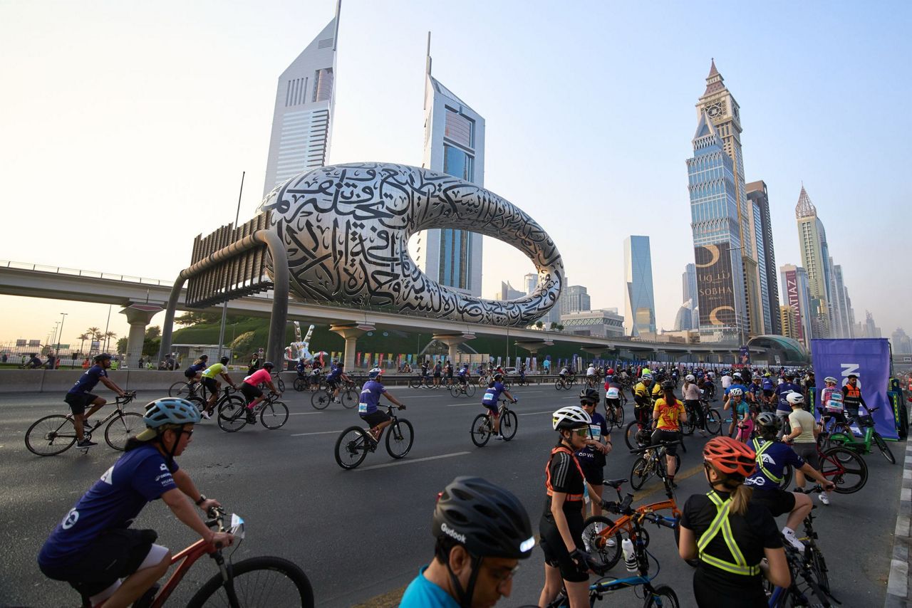 Thousands of bicycles take over Dubai's busiest highway as part of a ...