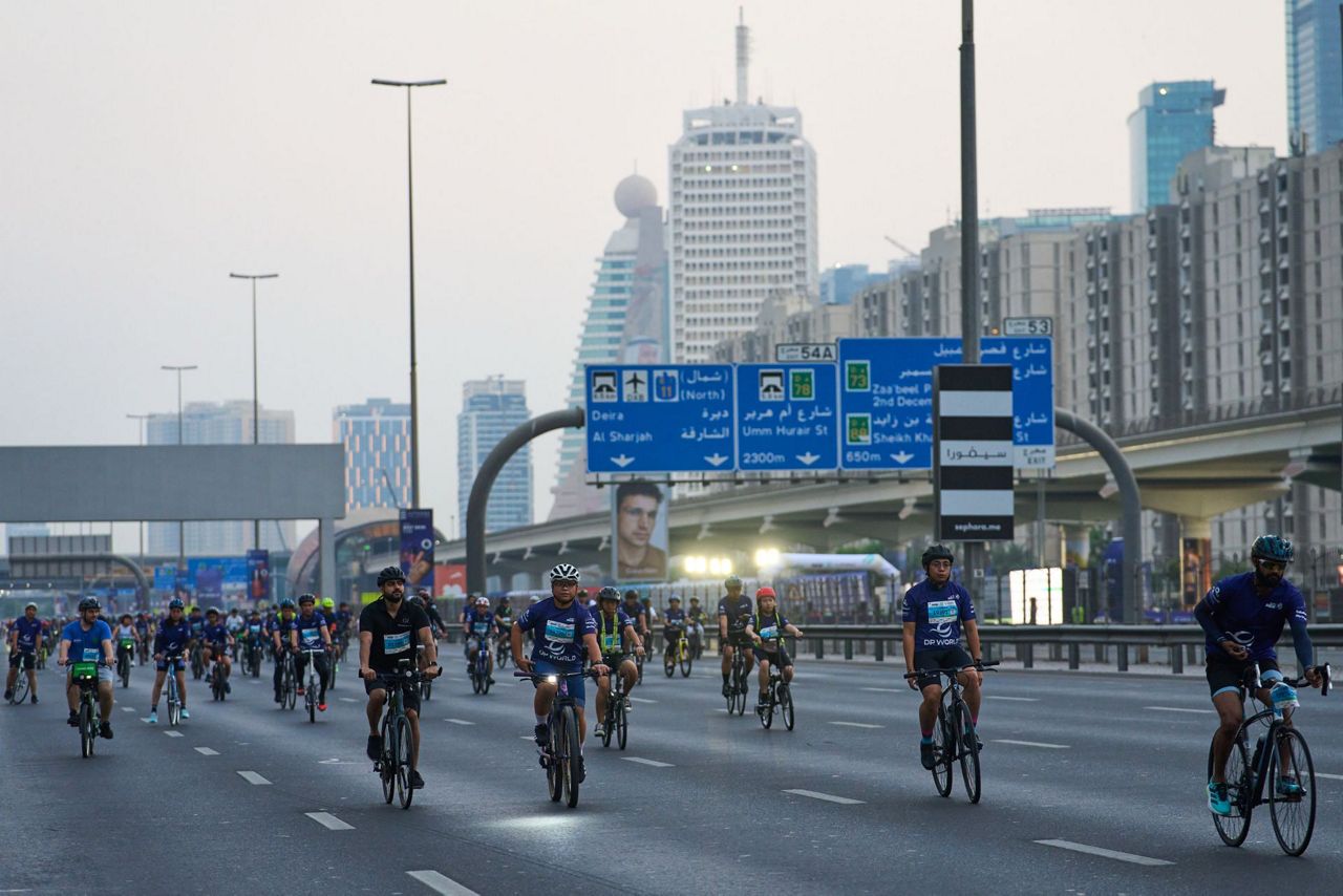 Thousands of bicycles take over Dubai's busiest highway as part of a ...