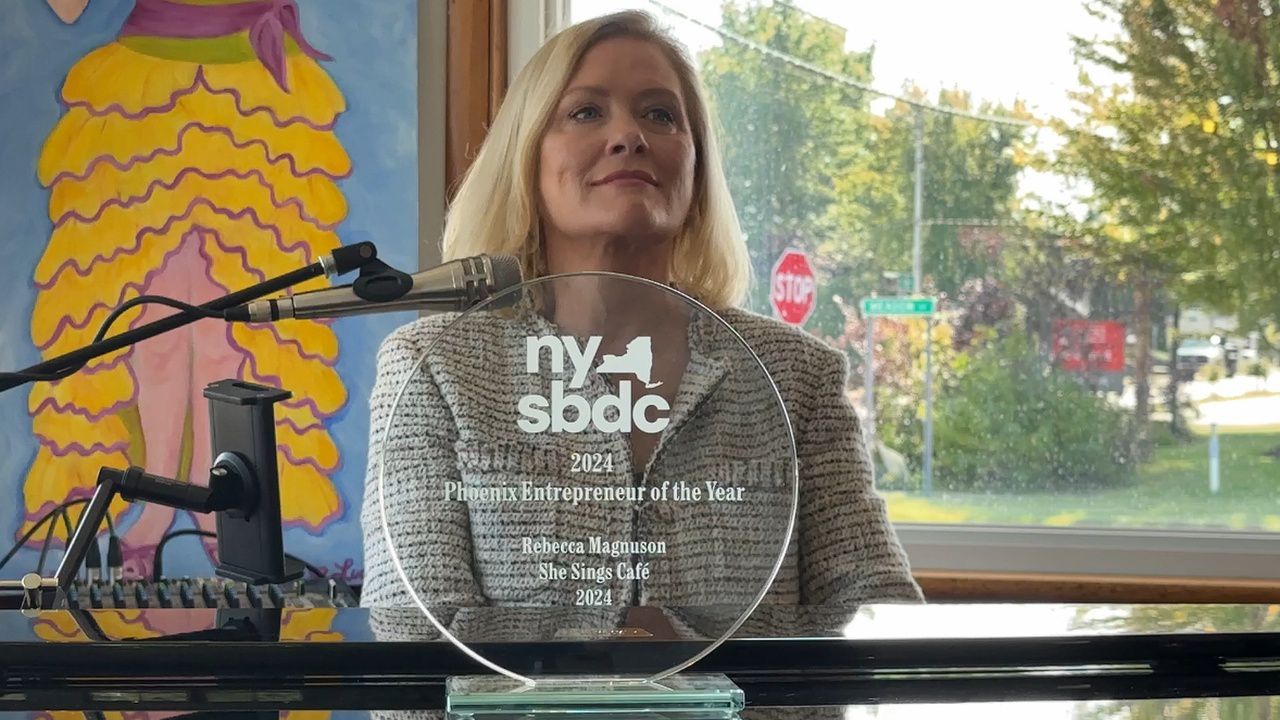 New York business owner wins award while also advocating for victims of abuse