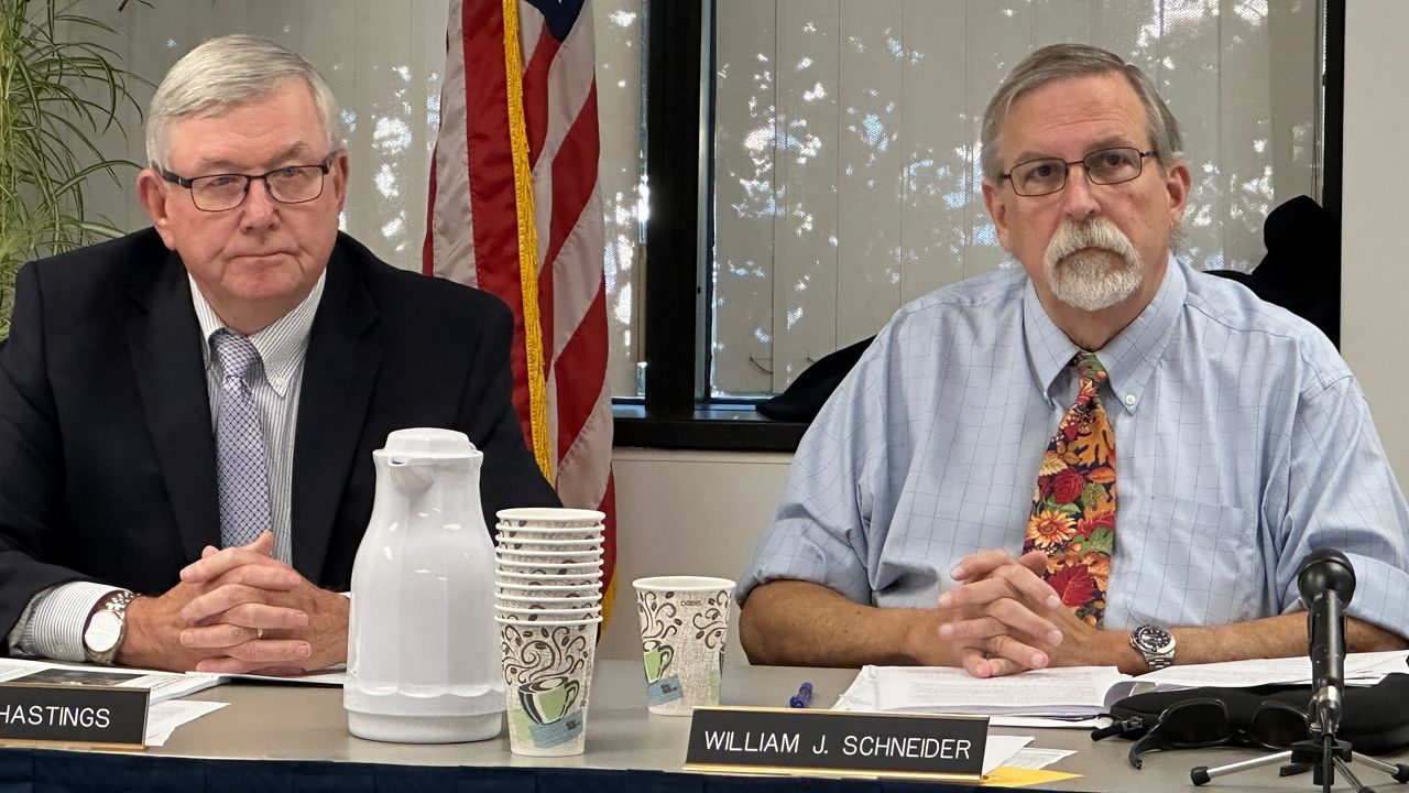 Maine Ethics Commission members David Hastings and William Schneider listen to testimony Wednesday. (Spectrum News/Susan Cover)