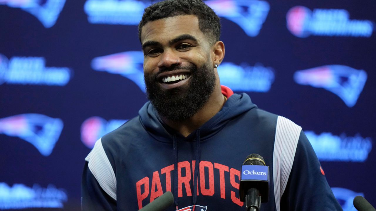 Ezekiel Elliott faces reporters following an NFL football practice, Wednesday, Sept. 27, 2023, in Foxborough, Mass. (AP Photo/Steven Senne)