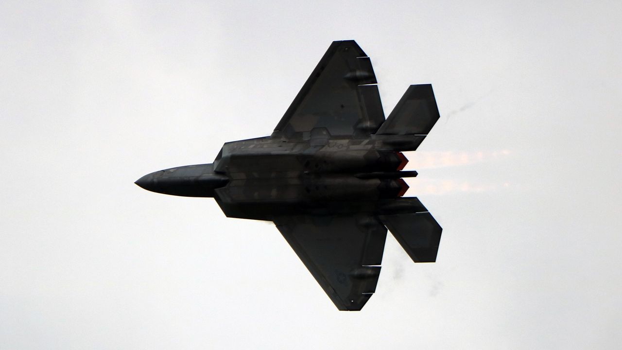 An F-22 aircraft soars through the sky at Scott Air Force Base Friday, May 12, during practice. At this weekend's air show, views can expect to see the aircraft perform backflips, cartwheels and more. (Spectrum News/Elizabeth Barmeier)