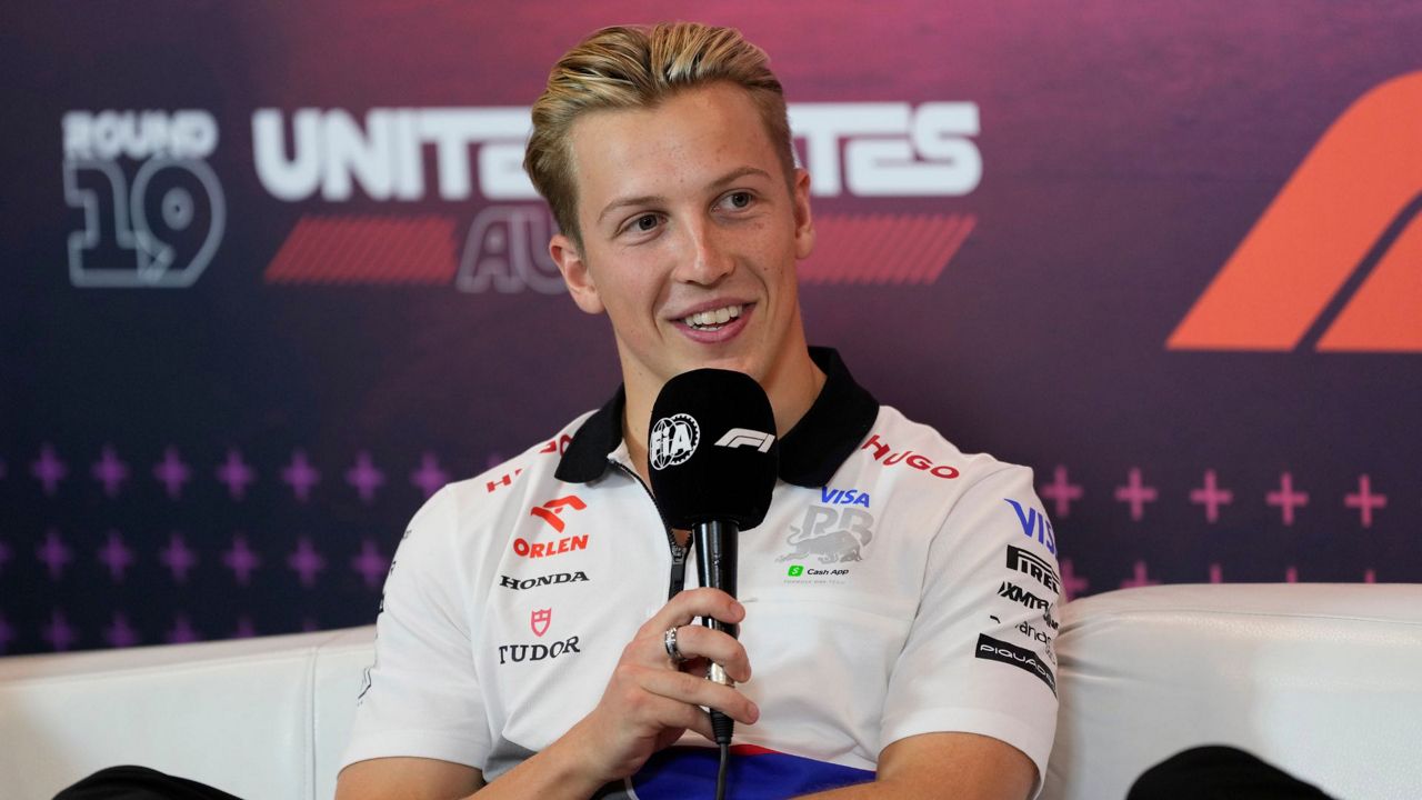 RB driver Liam Lawson, of New Zealand, responds to a question during a news conference for the Formula One U.S. Grand Prix auto race at the Circuit of the Americas, Thursday, Oct. 17, 2024, in Austin, Texas. (AP Photo/Eric Gay)