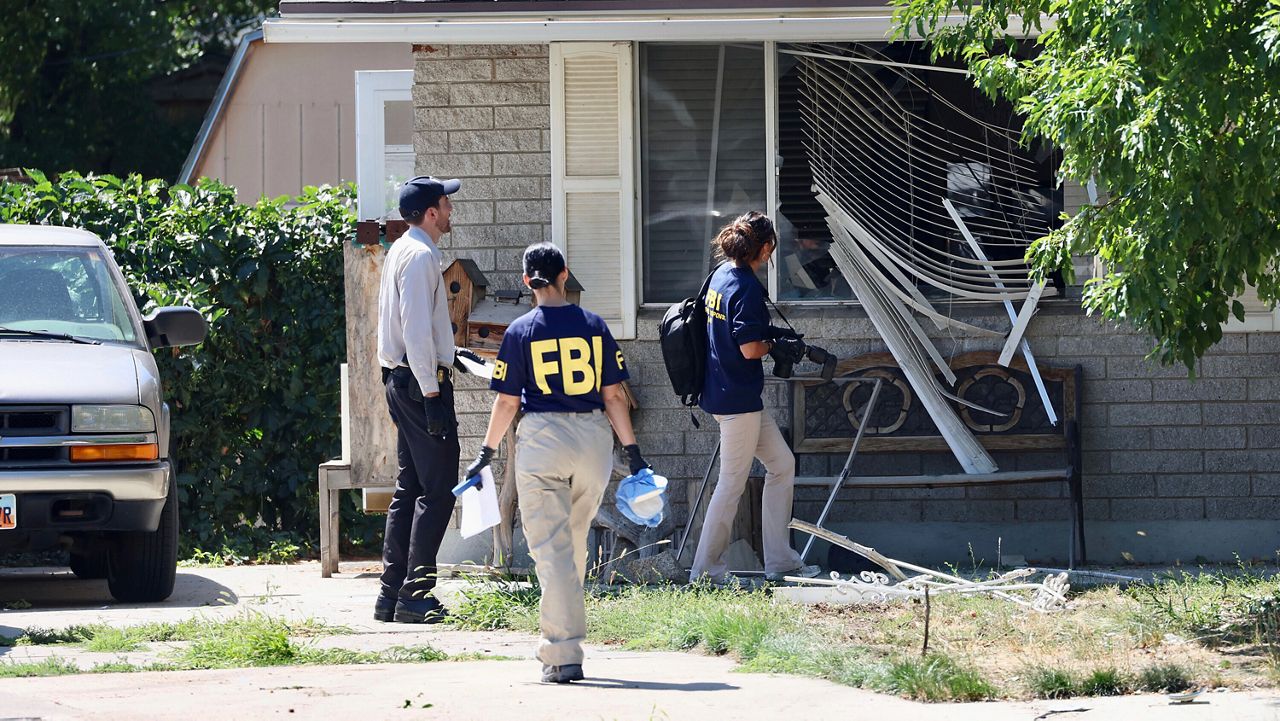 Law enforcement investigate the scene of a shooting involving the FBI on Aug. 9, 2023 in Provo, Utah.