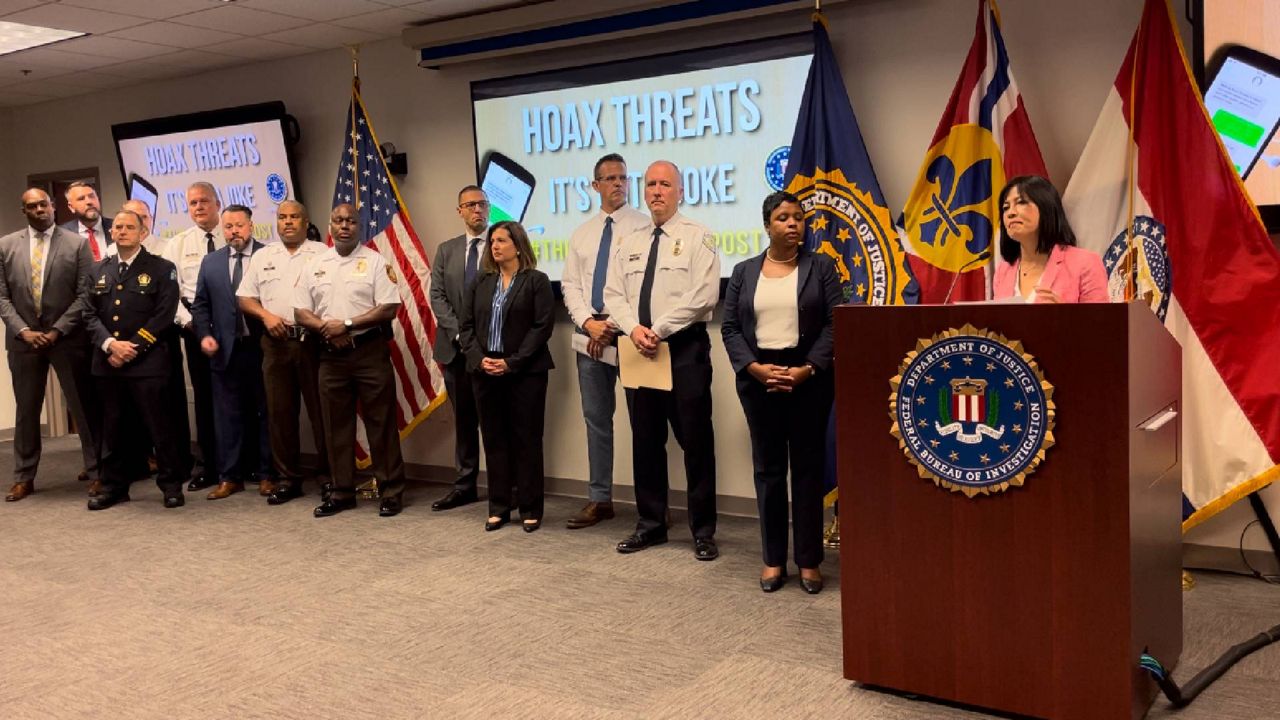 Representatives from the FBI, U.S. Attorney's Office, multiple St. Louis area police departments and the Parkway School District talked to reporters Friday at the FBI's St. Louis Field Office about the consequences of making threats against schools. (Spectrum News/Gregg Palermo)