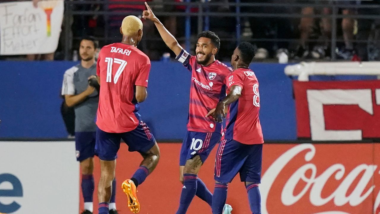 FC Dallas forward Jesús Ferreira (10) celebrates his goal against the Vancouver Whitecaps with Jáder Obrian (8) and Nkosi Tafari (17) during the second half of an MLS soccer match Wednesday, May 17, 2023, in Frisco, Texas. (AP Photo/LM Otero)