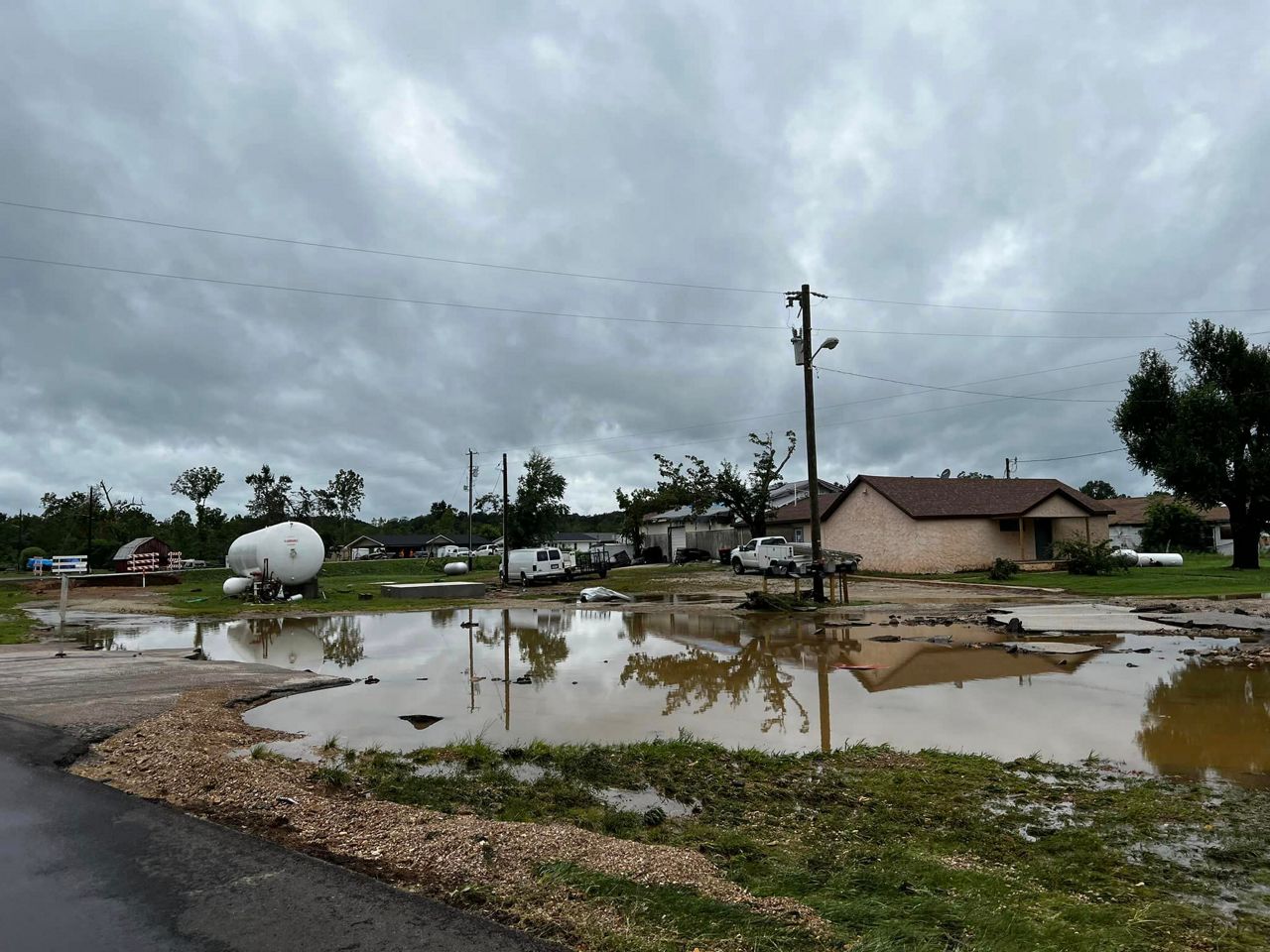 Flooded streets in Glenallen, Mo. still visible at noon on Aug. 14, 2023 after an early morning flash flooding event.