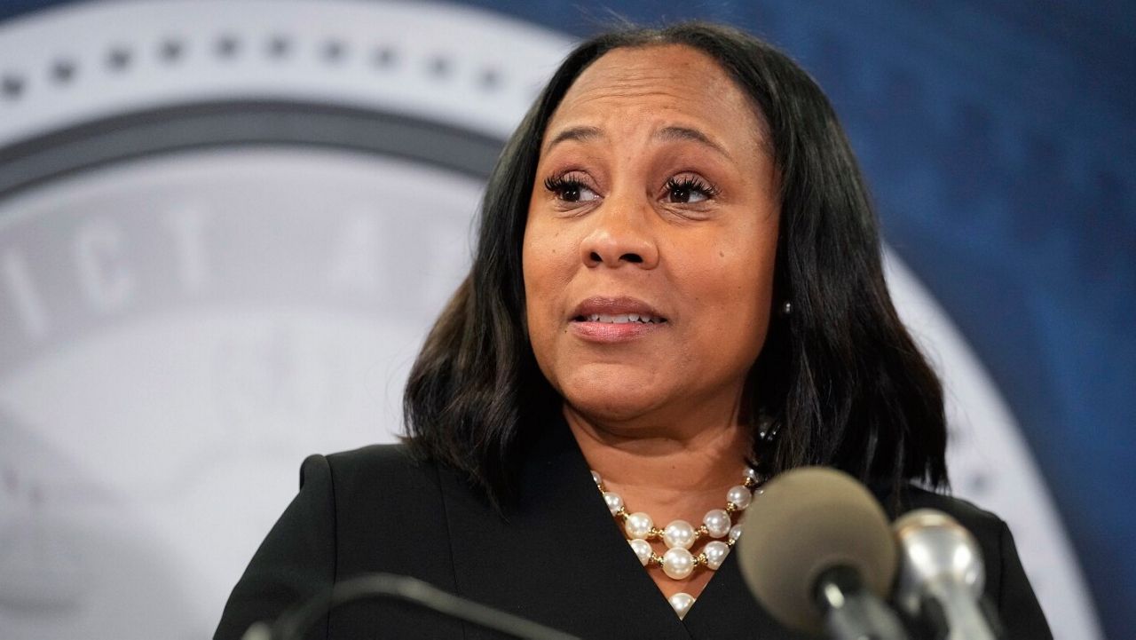 Fulton County District Attorney Fani Willis speaks in the Fulton County Government Center during a news conference, Monday, Aug. 14, 2023, in Atlanta. (AP Photo/John Bazemore)